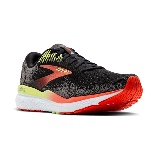 A pair of Brooks Ghost 16 running shoes for men with a black base color, featuring orange and yellow accents and a white midsole.