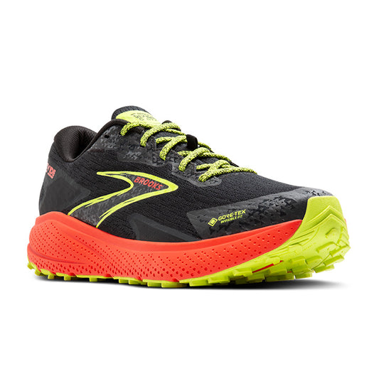 A pair of black, orange, and yellow Brooks Divide 5 GTX trail running shoes with lace-up closure.