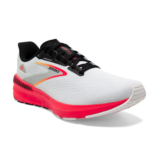 Brooks women's running shoe with white, pink, black, and orange color scheme.