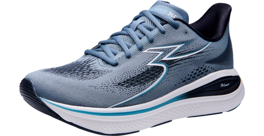 Blue running shoe with white sole on a white background