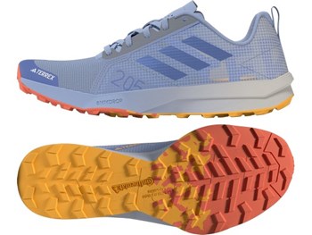 Adidas Women's Terrex Speed Flow trail running shoes with blue uppers and a Continental Rubber outsole in yellow and orange.