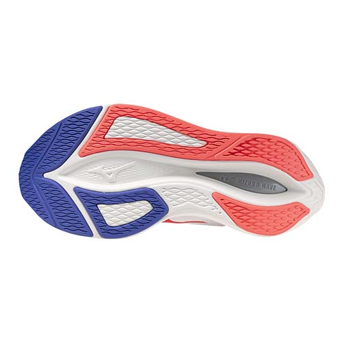 Close-up of a shoe sole with red, blue, and white design on a white background