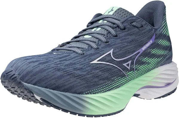A pair of Mizuno women's running shoes with a blue and green color scheme, featuring a lace-up closure and the Mizuno logo on the side.
