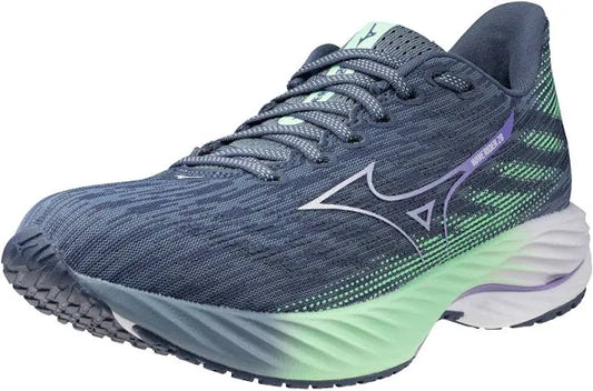 A pair of Mizuno women's running shoes with a blue and green color scheme, featuring a lace-up closure and the Mizuno logo on the side.