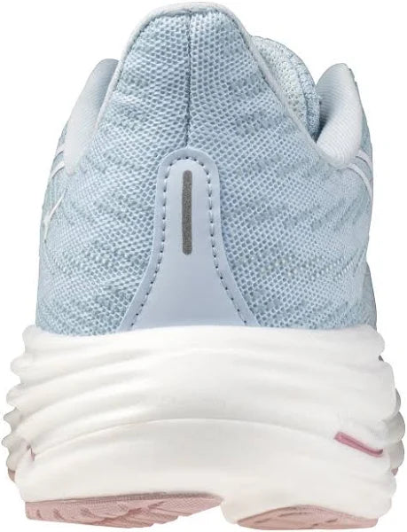 Light blue running shoe with white sole on a white background