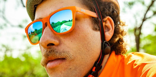 Goodr OGs sunglasses orange frame with blue lenses