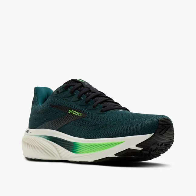 Green running shoe with black and white sole on a white background