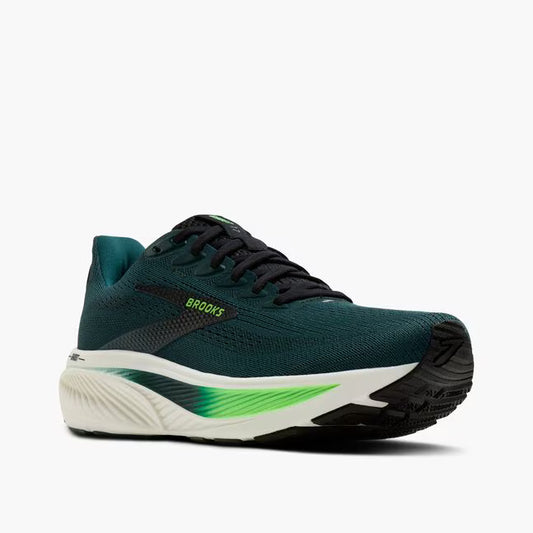 Green running shoe with black and white sole on a white background