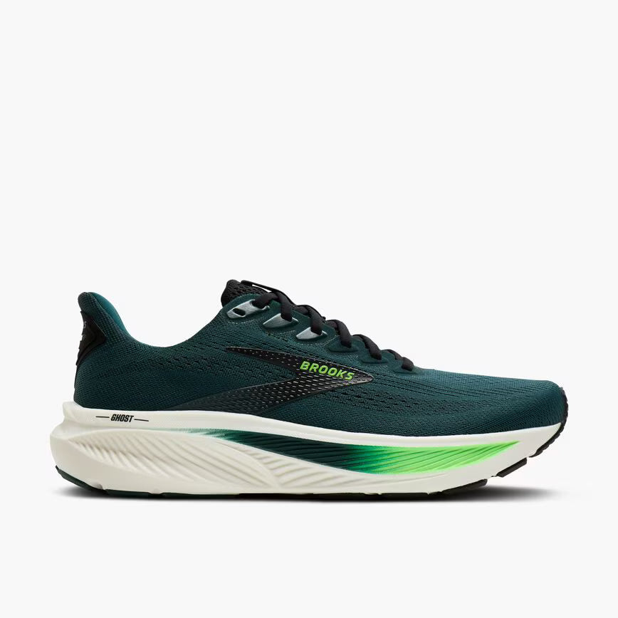 Green running shoe with white sole on a light gray background
