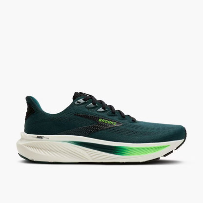 Green running shoe with white sole on a light gray background
