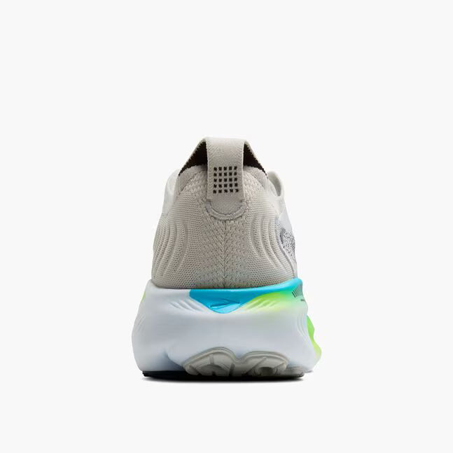 Back view of a gray sneaker with a colorful sole on a white background