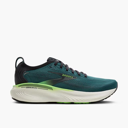 Green running shoe with white sole on a light gray background