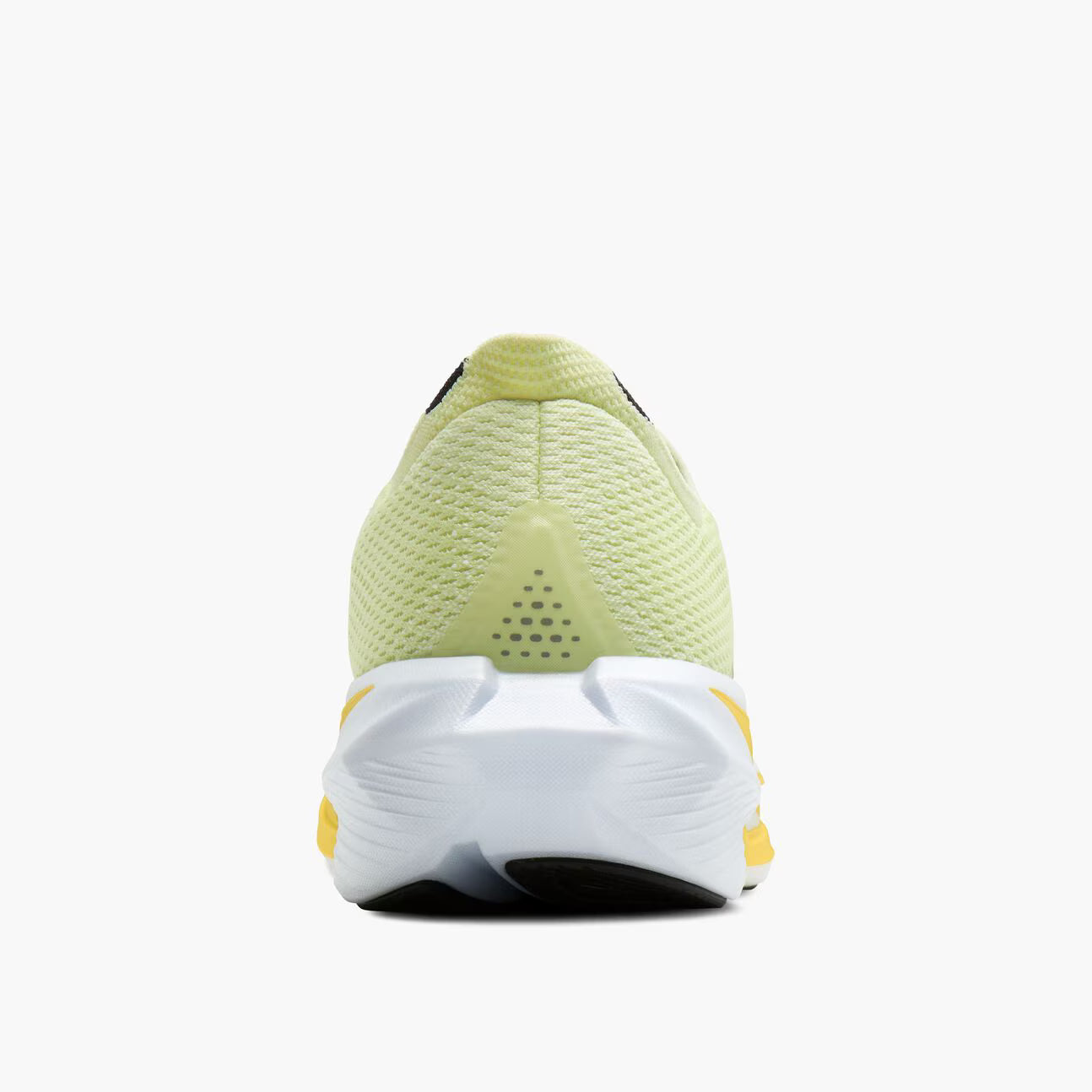 Back view of a yellow and white athletic shoe on a white background