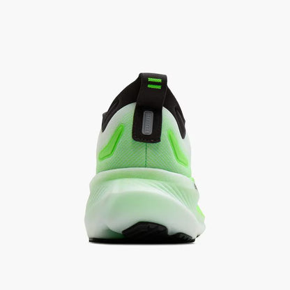 Back view of a green and black athletic shoe on a white background