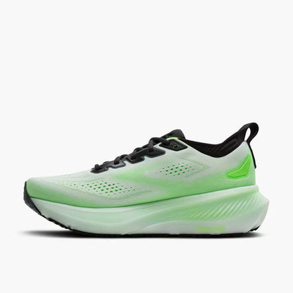 Green running shoe with black accents on a white background