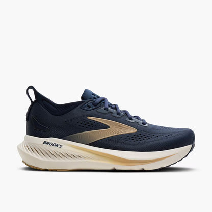 Navy running shoe with beige accents on a white background