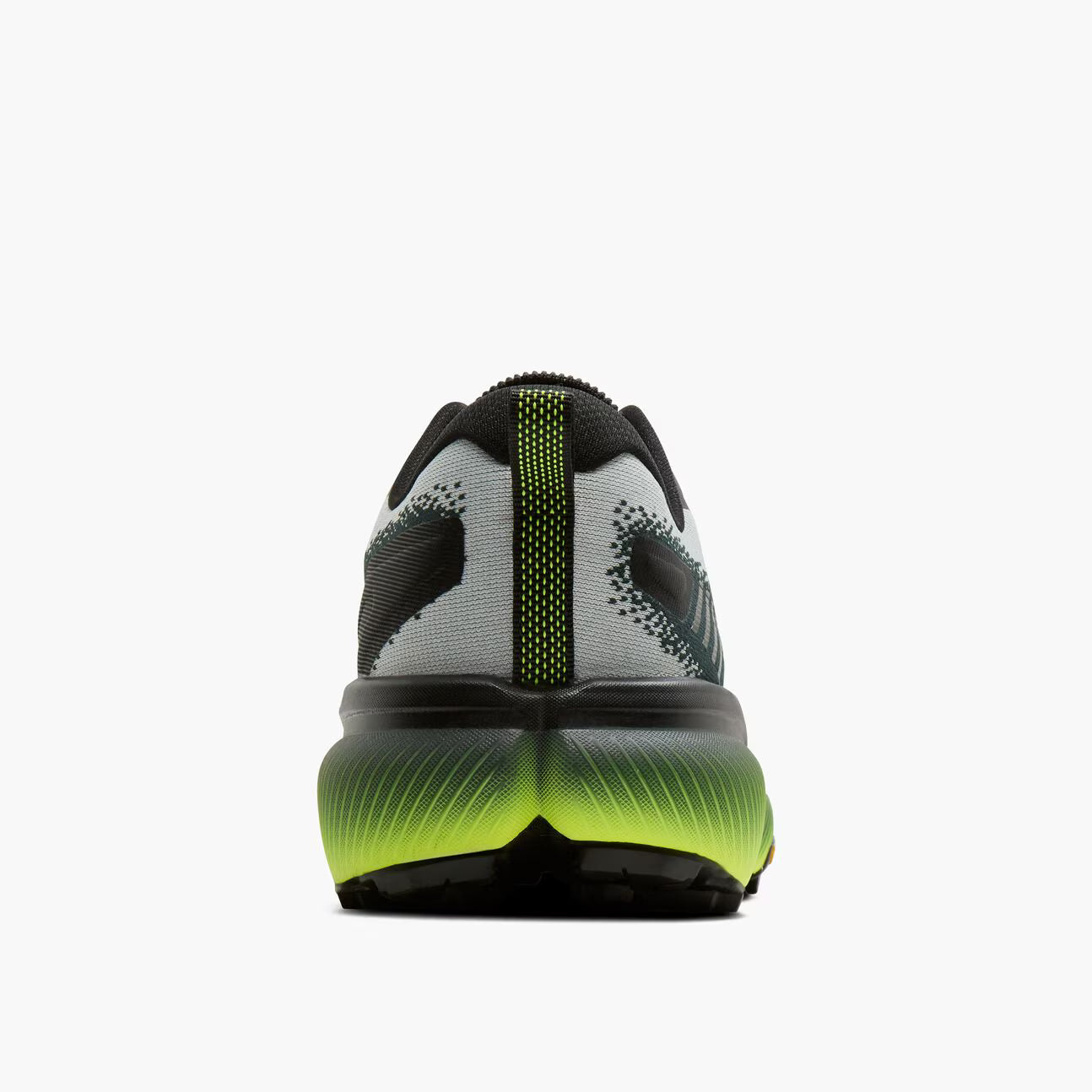 Back view of a black and green athletic shoe on a white background