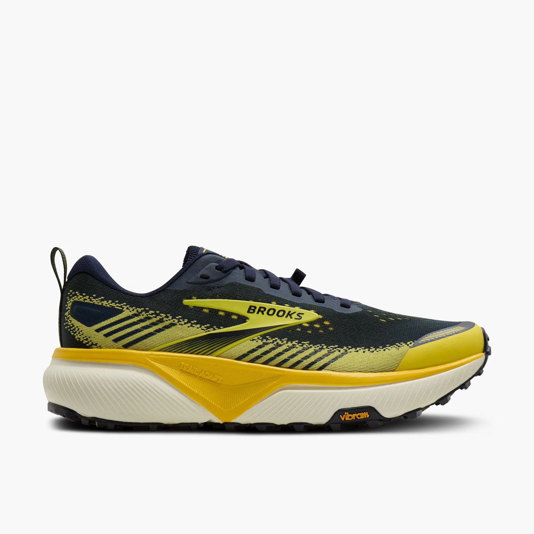 Brooks Cascadia 20 running shoe in navy blue and bright yellow, featuring a thick white and yellow midsole and a Vibram outsole, shown from a side profile on a light gray background.