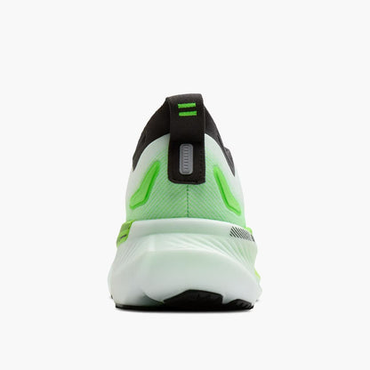 Back view of a running shoe with green and black design on a white background