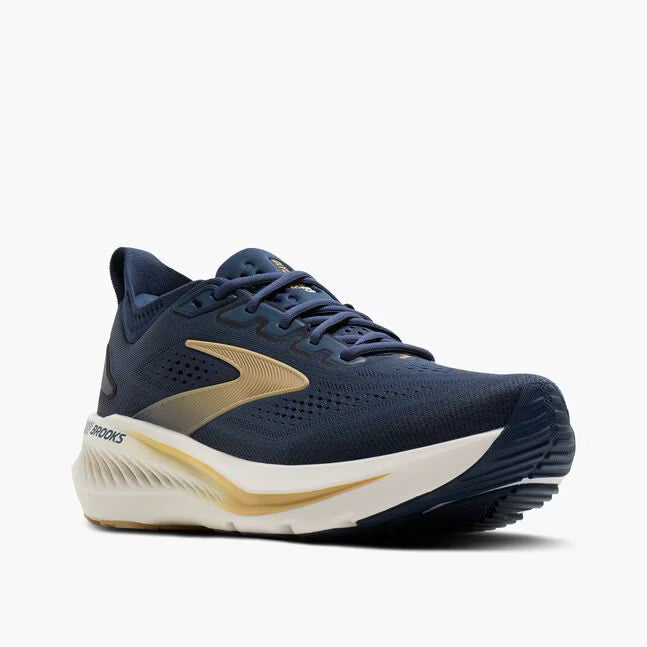 Navy running shoe with gold accents on a white background