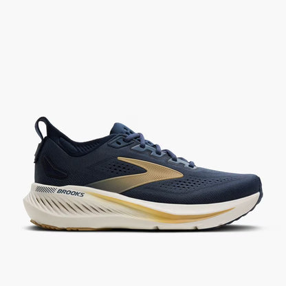Navy running shoe with gold accents on a white background