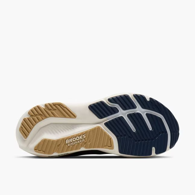 Sole of a running shoe with 'Brooks' branding on a white background