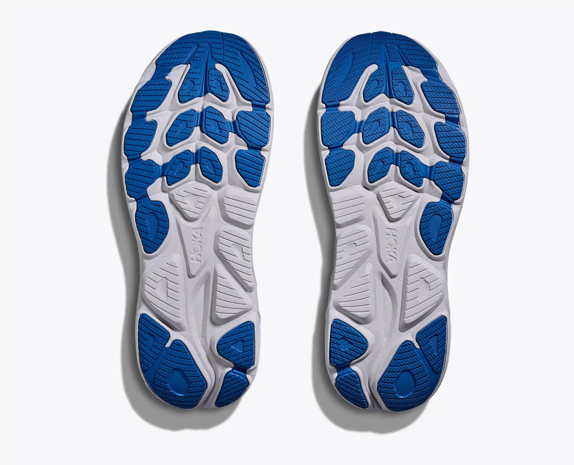 Hoka Men's Clifton 10 Pair of blue and white athletic shoes showing sole design on a white background
