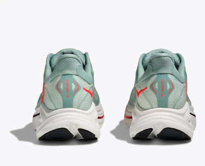 Pair of light blue Hoka Clifton 10 men's  running shoes with red accents on a white background