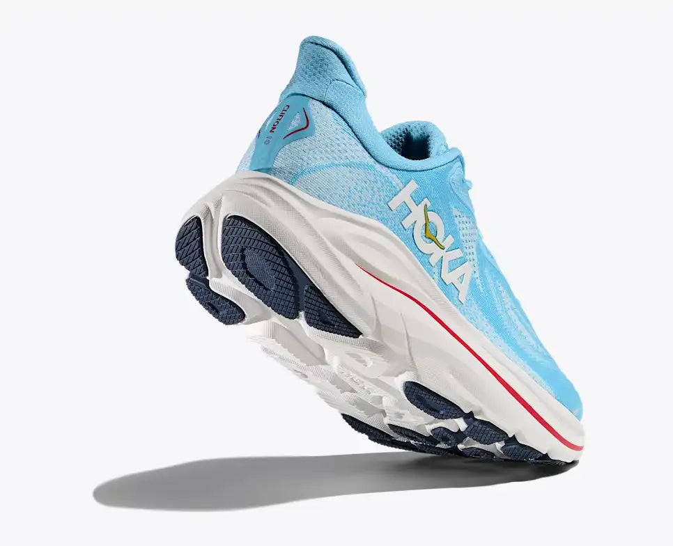 Blue running shoe with white sole on a white background