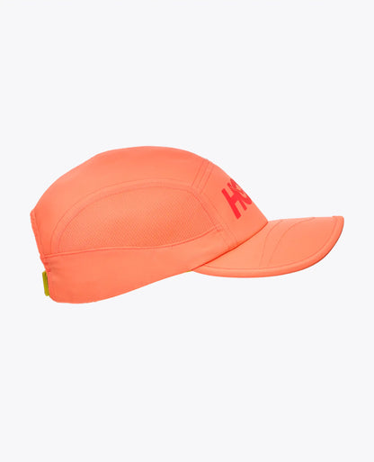 Hoka neon cantaloupe cap with a logo on a white background