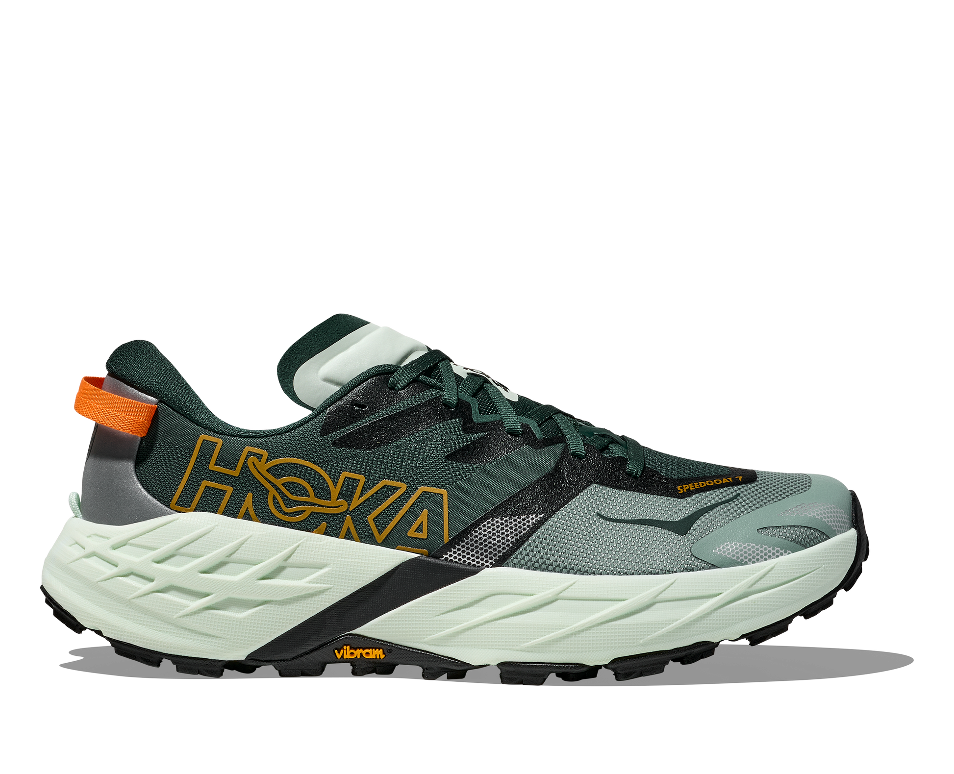 Green running shoe with orange accents on a white background