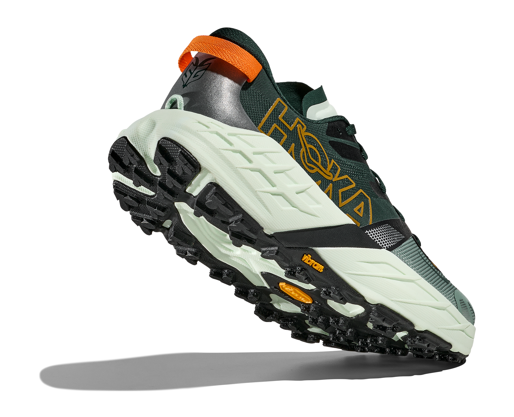 Green and black sneaker with orange accents on a white background
