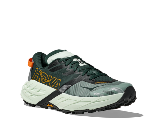 Green and gray running shoe with white sole on a white background