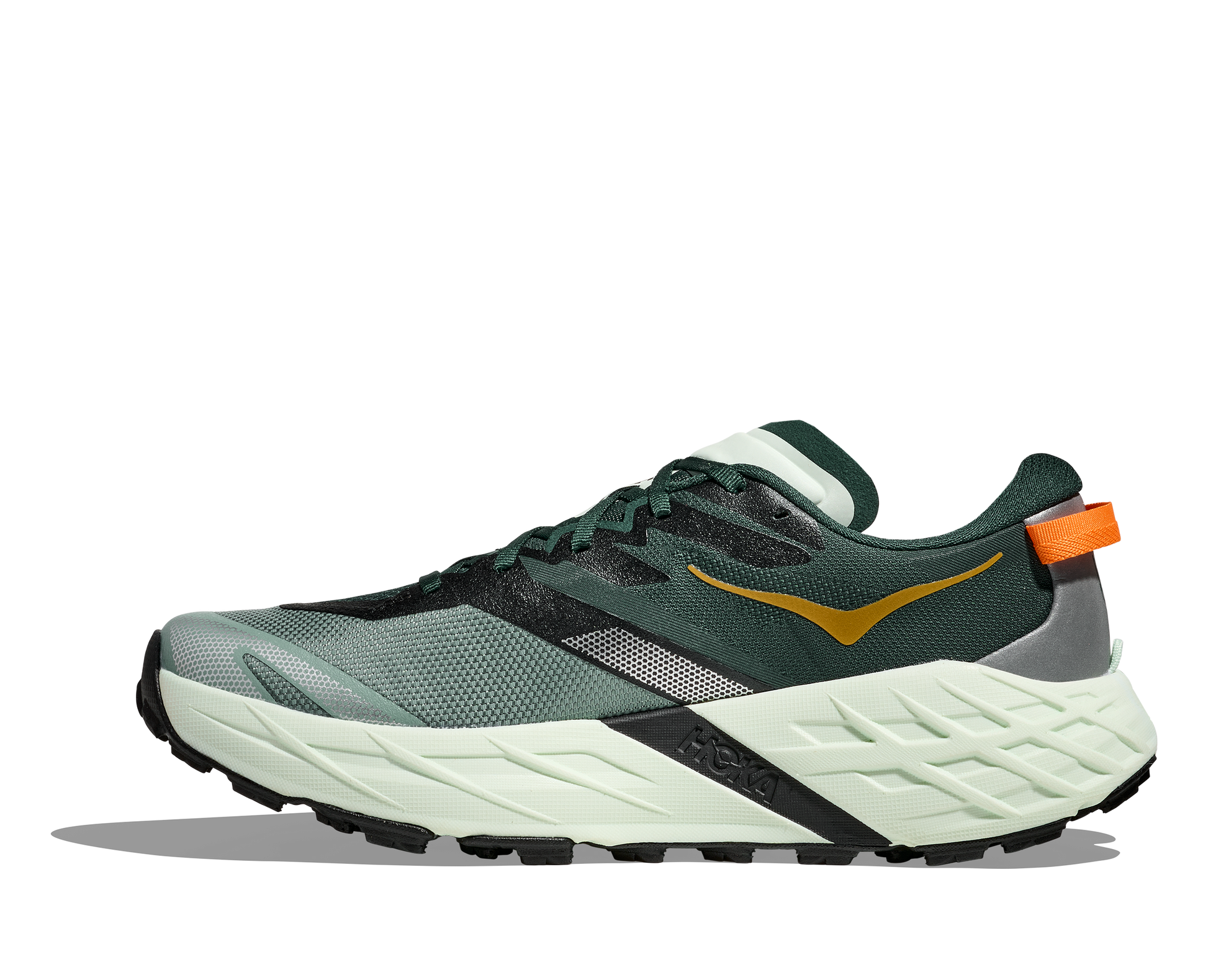 Green and black running shoe with orange accents on a white background