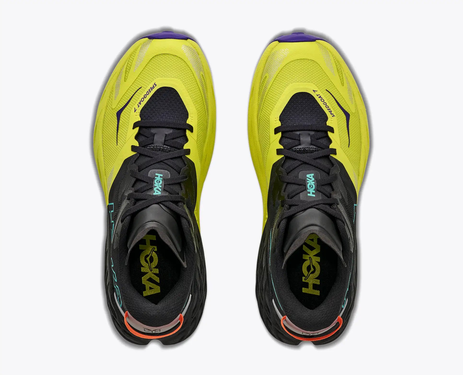 A pair of Hoka Men's Speedgoat 7 running shoes shown from a top-down view, featuring a bright neon yellow and black design with small purple and orange accents.