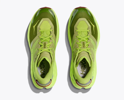 Pair of neon green sneakers on a white background