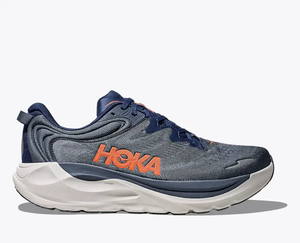 Grey Hoka running shoe on a white background