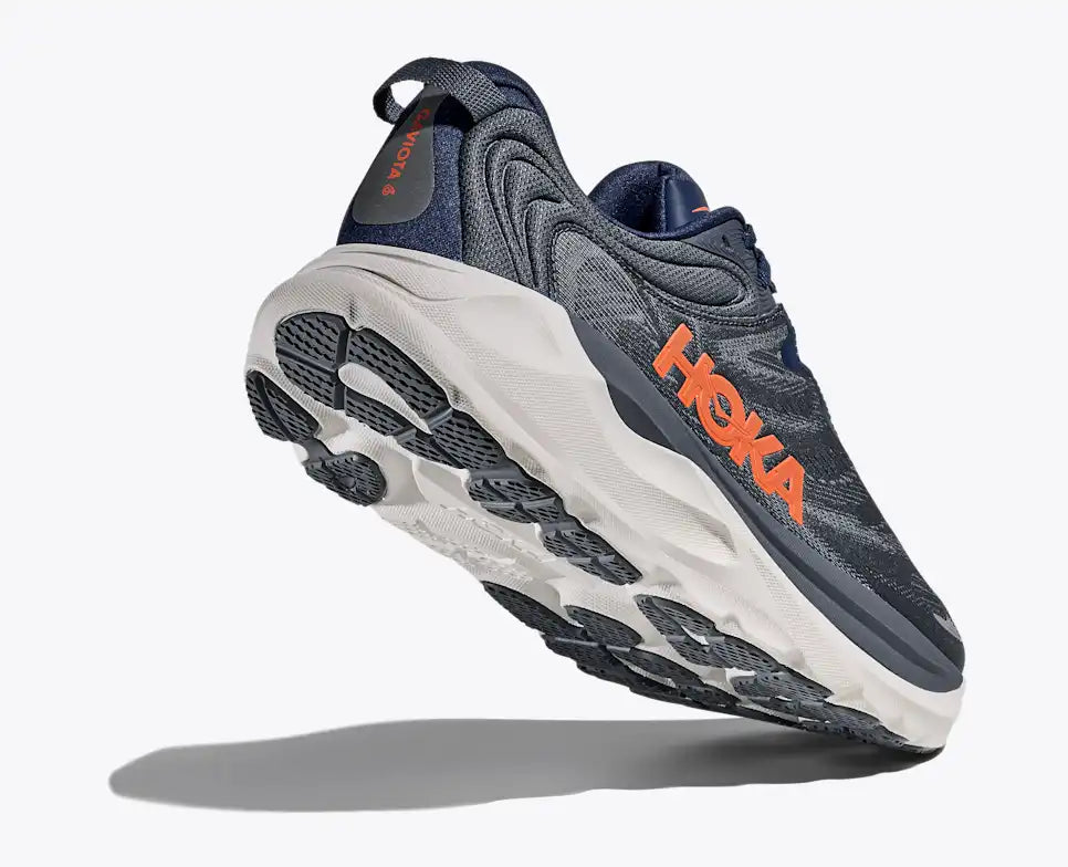 Grey Hoka running shoe on a white background