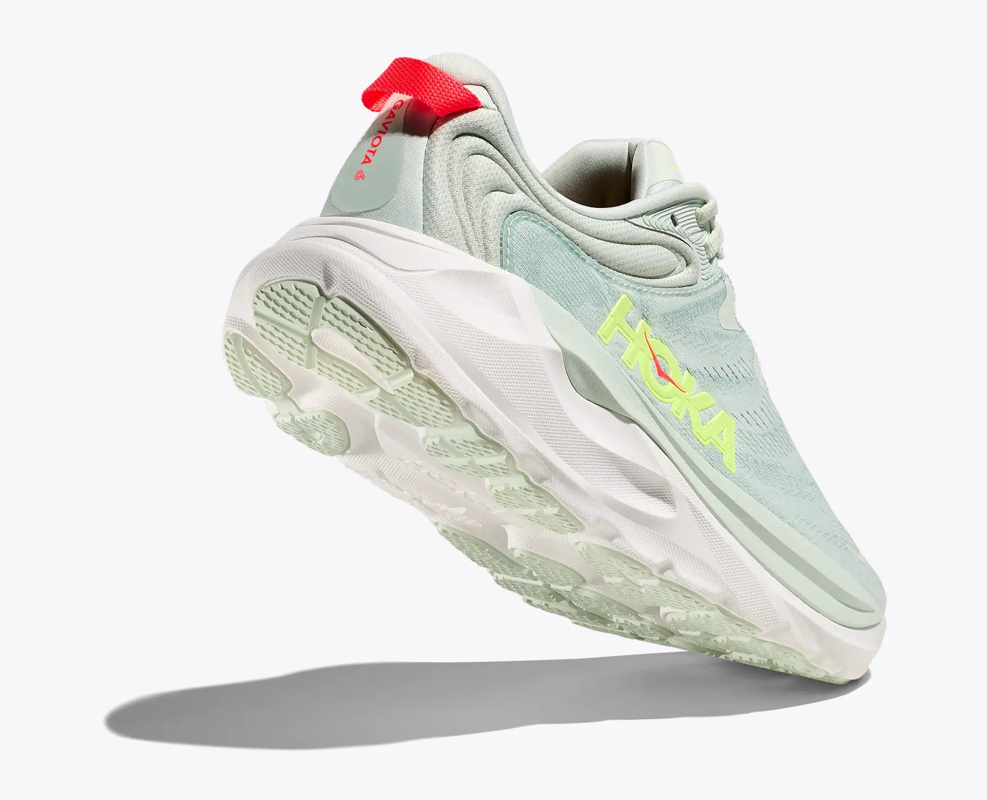 Light blue running shoe with white sole on a white background