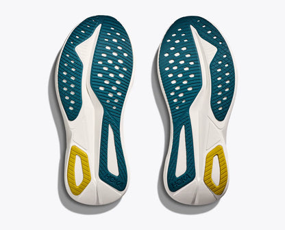 Pair of shoe insoles with green and yellow accents on a white background
