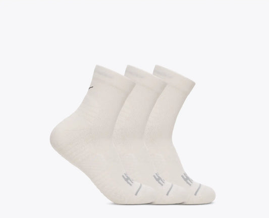Three pairs of white Hoka socks with a brand logo on a light gray background
