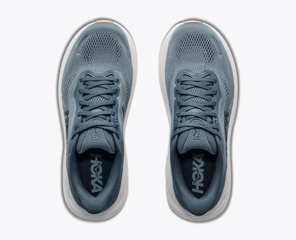 A pair of Hoka running shoes in a dusty slate blue color, shown from a top-down view on a light gray background.