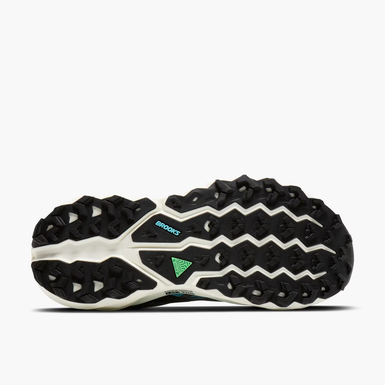 Black and white sneaker with a green logo on a white background