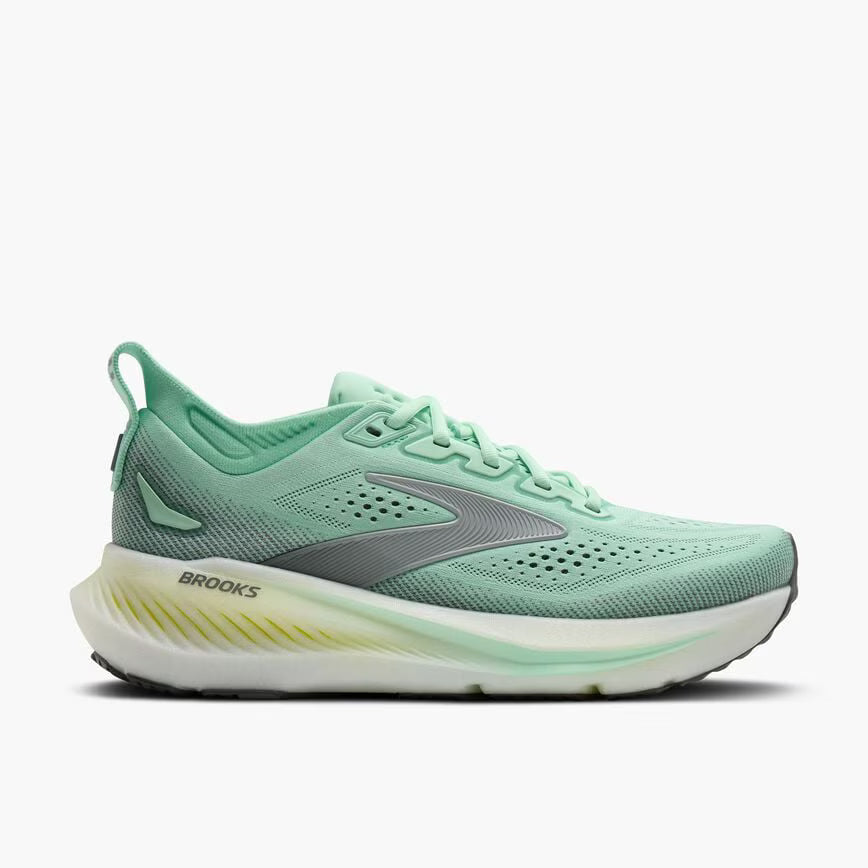 Green running shoe with Brooks logo on a white background