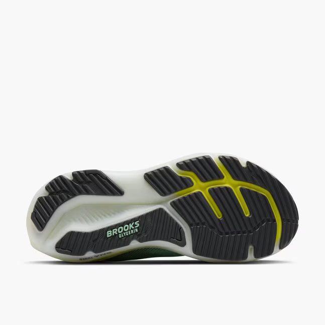 Sole of a running shoe with 'Brooks' branding on a white background