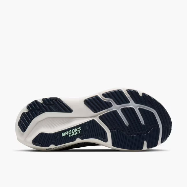 Navy and white running shoe sole with 'Brooks' branding on a white background