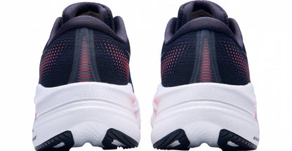 Navy and white running shoes with red accents on a white background