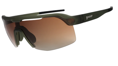 Goodr Bolt G The Jungle Is My Gym wraparound Sunglasses with a gradient brown lens and black frame on a white background