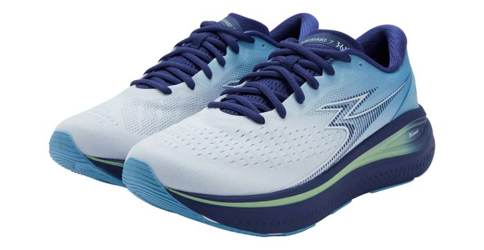 White running shoes with blue accents on a white background