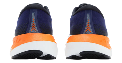 Navy and orange running shoes shown from the back on a white background